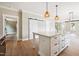 Spacious kitchen featuring island, stainless appliances, and an adjacent dining area at 150 Purslane Dr, Franklinton, NC 27525