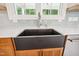 Kitchen sink with stainless faucet, white countertops and natural wood cabinets at 150 Purslane Dr, Franklinton, NC 27525