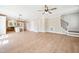 Bright and open living room with hardwood floors and a view to the kitchen at 150 Purslane Dr, Franklinton, NC 27525