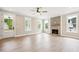 Spacious living room with natural light, hardwood floors, fireplace and white trim at 150 Purslane Dr, Franklinton, NC 27525