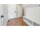 Convenient mud room featuring built-in bench, storage cubbies and modern finishes at 150 Purslane Dr, Franklinton, NC 27525