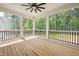 Screened in porch with ceiling fan and wooden floor at 150 Purslane Dr, Franklinton, NC 27525
