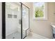 Tiled shower with bench and niche at 150 Purslane Dr, Franklinton, NC 27525
