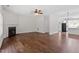 Open living room with fireplace and views to the kitchen area at 1505 Poets Glade Dr, Apex, NC 27523