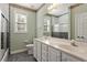 Bathroom with double vanity, tile floor, shower and stylish decor at 175 Georgetown Woods Dr, Youngsville, NC 27596