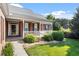 Charming porch with white railings and pillars, adding character to this inviting home at 175 Georgetown Woods Dr, Youngsville, NC 27596