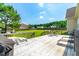 Spacious back deck with outdoor seating overlooking a large, grassy backyard and mature trees at 20 Kola Nut, Smithfield, NC 27577