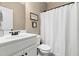 Bright bathroom featuring a single sink vanity and white shower curtain at 20 Kola Nut, Smithfield, NC 27577
