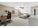 Spacious bedroom with a desk, ceiling fan, and a bed under an angled ceiling at 20 Kola Nut, Smithfield, NC 27577