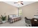 Bedroom features a desk, daybed, ceiling fan and natural light from a window at 20 Kola Nut, Smithfield, NC 27577