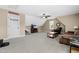 Spacious bonus room featuring a ceiling fan, comfortable seating and a tv at 20 Kola Nut, Smithfield, NC 27577