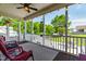 Charming screened porch offering outdoor seating with a view of a spacious backyard at 20 Kola Nut, Smithfield, NC 27577