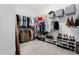 Spacious walk-in closet with custom shelving, shoe racks, and ample storage space at 20 Kola Nut, Smithfield, NC 27577