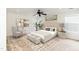 Stylishly decorated bedroom with a king size bed, a comfortable chair, and elegant rug at 212 Mickleson Ridge Dr, Raleigh, NC 27603