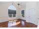 Bedroom with vaulted ceilings, large arched windows, and a ceiling fan at 212 Mickleson Ridge Dr, Raleigh, NC 27603