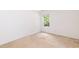 Bedroom featuring neutral walls, carpet and natural light from one window at 212 Mickleson Ridge Dr, Raleigh, NC 27603