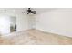Spacious empty bedroom with neutral walls, carpet, and natural light. It adjoins the ensuite bathroom at 212 Mickleson Ridge Dr, Raleigh, NC 27603