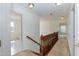 Hallway upstairs with access to bedrooms at 212 Mickleson Ridge Dr, Raleigh, NC 27603
