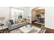 Cozy living room with comfortable seating, natural light, and access to the dining area enhancing the home's layout at 212 Mickleson Ridge Dr, Raleigh, NC 27603
