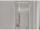 A bathroom shower featuring sliding glass doors and silver trim at 213 N Weststone Blvd, Fuquay Varina, NC 27526