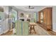 Cozy living room with comfortable seating, fireplace, and a large decorative armoire at 213 N Weststone Blvd, Fuquay Varina, NC 27526