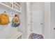 Mudroom with convenient storage featuring cubbies, hooks, and a bench, perfect for organization at 213 N Weststone Blvd, Fuquay Varina, NC 27526