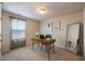 Bright home office with desk, stylish decor, and natural light, perfect for a productive work environment at 217 Windy Knoll Dr, Graham, NC 27253