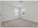 Empty bedroom with carpet and windows at 239 Faith Avenue, Sanford, NC 27330