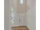 Welcoming foyer with soaring ceilings, modern lighting, and hardwood floors at 239 Faith Avenue, Sanford, NC 27330