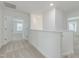 Bright hallway with carpet and access to multiple rooms at 239 Faith Avenue, Sanford, NC 27330