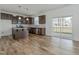 Modern kitchen with stainless steel appliances, granite counters, and an island at 239 Faith Avenue, Sanford, NC 27330