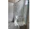 Bright bathroom featuring a glass shower with marble tile, modern fixtures and a bench at 2432 Nassau Trce, Fuquay Varina, NC 27526