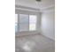 A bright bedroom featuring plush carpet and multiple windows at 2432 Nassau Trce, Fuquay Varina, NC 27526