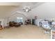 Large bonus room has vaulted ceilings, an office area and plenty of space to relax at 26 Shadymont Dr, Pittsboro, NC 27312
