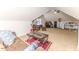 Large bonus room offers an office space, vaulted ceilings, plush carpet and relaxed seating at 26 Shadymont Dr, Pittsboro, NC 27312