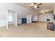 Massive bonus room offers vaulted ceilings, plush carpeting, plus a bedroom with an ensuite bathroom at 26 Shadymont Dr, Pittsboro, NC 27312