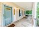 Inviting front porch with a swing, offering a relaxing outdoor space at 26 Shadymont Dr, Pittsboro, NC 27312