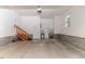 Spacious garage with block foundation, window, and utility sink at 26 Shadymont Dr, Pittsboro, NC 27312