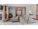 Spacious living room with fireplace, built-in shelves, and an inviting entry with hardwood flooring at 26 Shadymont Dr, Pittsboro, NC 27312