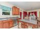 Open kitchen featuring stainless appliances, a kitchen island and bright natural lighting at 2810 Catamaunt, Durham, NC 27704