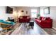 Relaxing living room showcases stylish seating, modern flooring, and a media setup at 3441 Jordan Shires Dr, New Hill, NC 27562