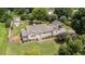 Charming single-story home with well-manicured lawn, carport, fenced yard and separate storage building at 409 Trail Two, Burlington, NC 27215