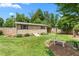 Well-kept backyard shed with accessible ramp, offering practical storage in a serene setting at 409 Trail Two, Burlington, NC 27215