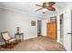 Bedroom with carpet, ceiling fan, and view into hall at 409 Trail Two, Burlington, NC 27215
