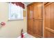 Pantry with storage and a window featuring a small curtain at 409 Trail Two, Burlington, NC 27215