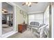 Bright sunroom with wicker furniture and lots of natural light at 409 Trail Two, Burlington, NC 27215