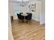 Chic dining room featuring wood floors, recessed lighting, and modern decor at 41 Lakewood Dr, Roxboro, NC 27573