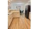 Open-concept kitchen area with granite countertops and stainless steel refrigerator at 41 Lakewood Dr, Roxboro, NC 27573