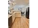 Kitchen area showcasing granite countertops, stainless steel appliances, and a view to the dining space at 41 Lakewood Dr, Roxboro, NC 27573