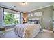 Bedroom with natural light and calm color palette at 4106 Sweet Ivy Lndg # 179, Durham, NC 27703